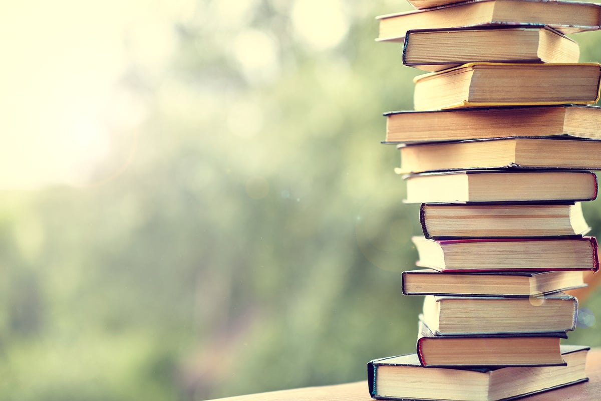 best books home library background. read vintage books in a row. college library table. vintage books publishing